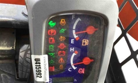 kubota skid steer warning light symbol